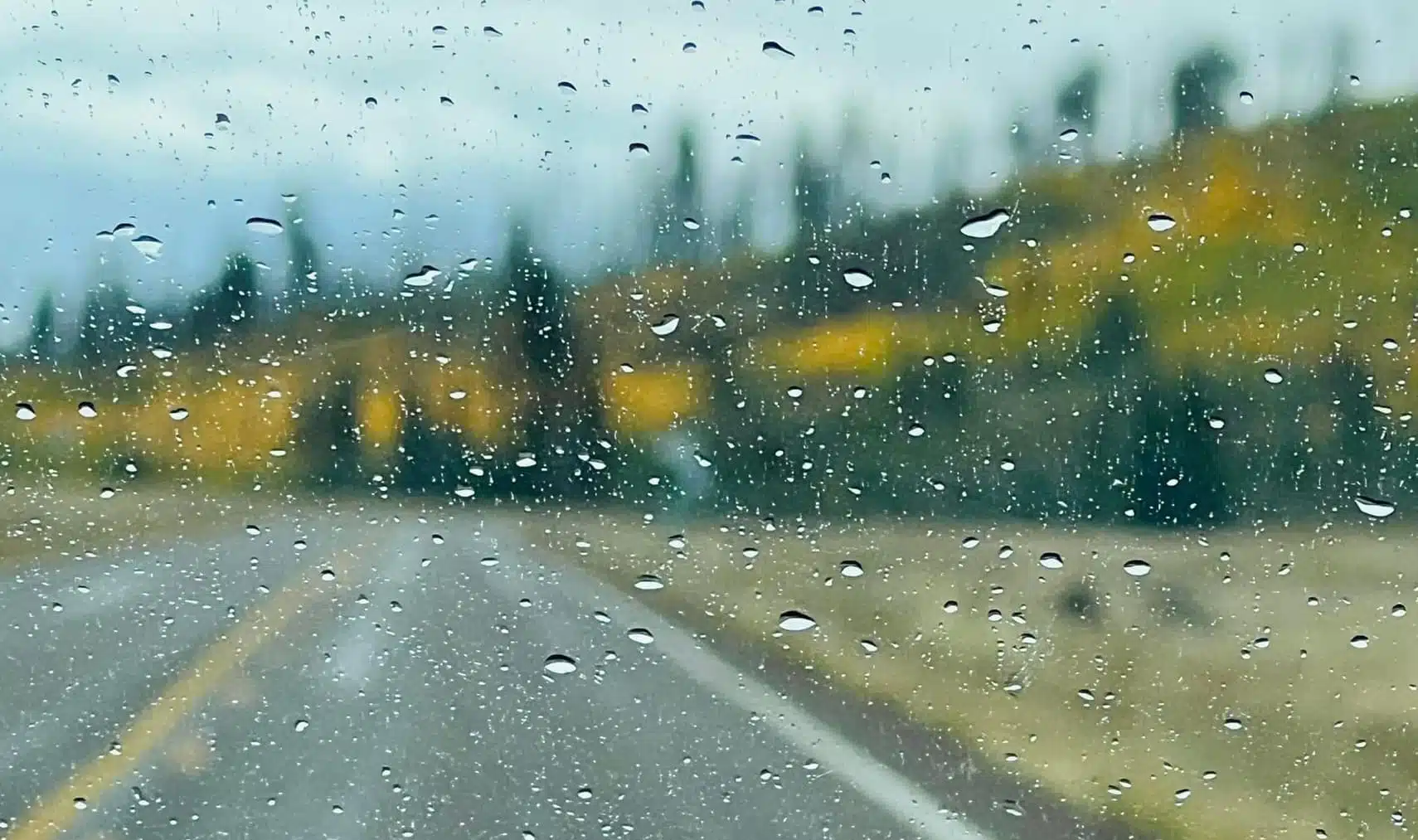 Raindrops on the windshield during an autumn drive to Greer